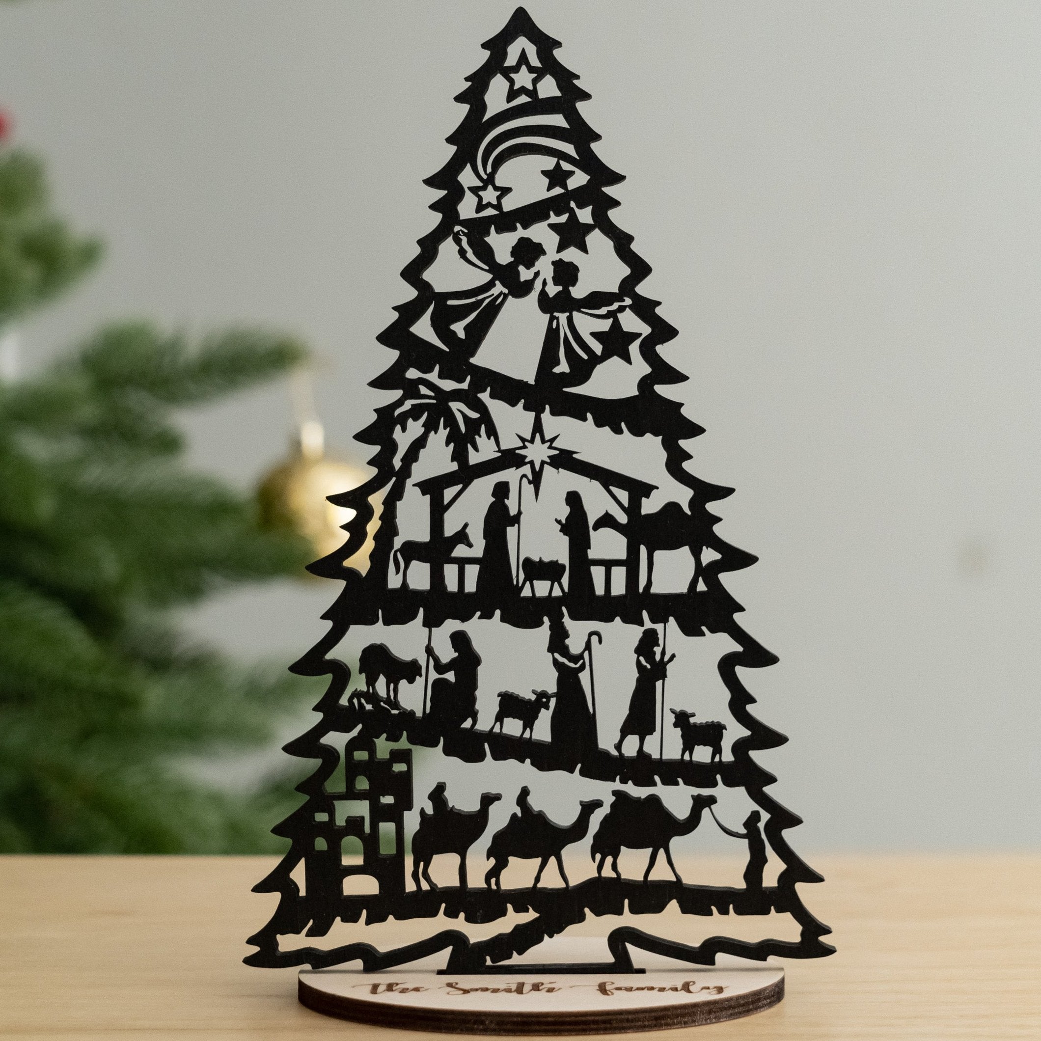 Festive Wooden Christmas Tree Decoration for a Cheerful Tabletop